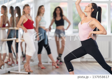 Female dancer performing solo dance in high heels workshop 137058617