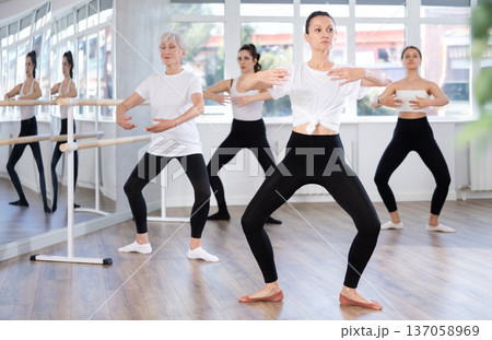 Group of women rehearsing ballet dance 137058969