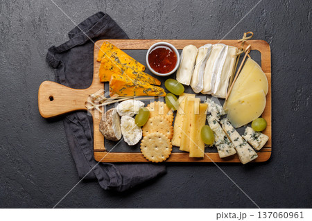 Cheese board with olives and honey 137060961
