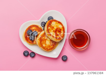 Homemade pancakes with blueberries and syrup Homemade pancakes with blueberries and syrup 137061384