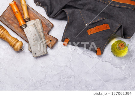 Meat cooking utensils on marble table 137061394