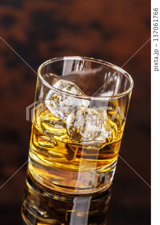 Glass of whiskey with ice Glass of whiskey with ice 137061766