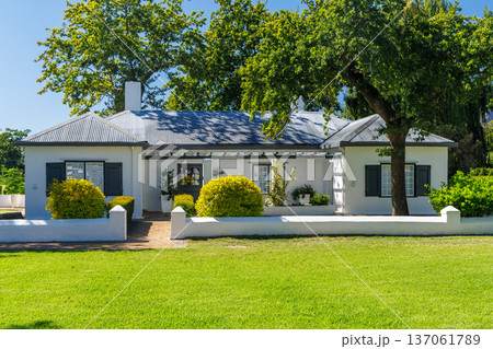 Winery house surrounded by lush greenery Winery house surrounded by lush greenery 137061789