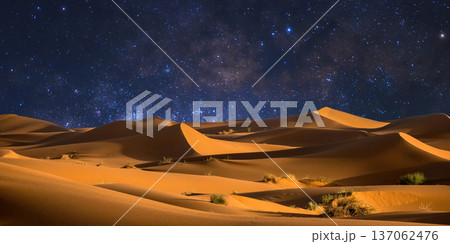 night landscape with desert dunes, starry sky and milky way in desert, abstract background. 137062476