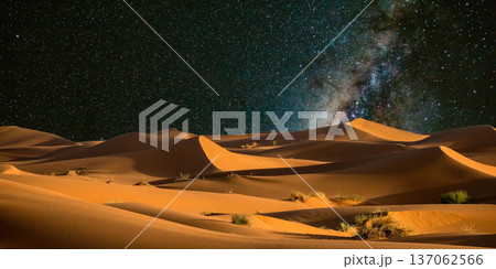 night landscape with desert dunes, starry sky and milky way in desert, abstract background. night landscape with desert dunes, starry sky and milky way in desert, abstract background. 137062566