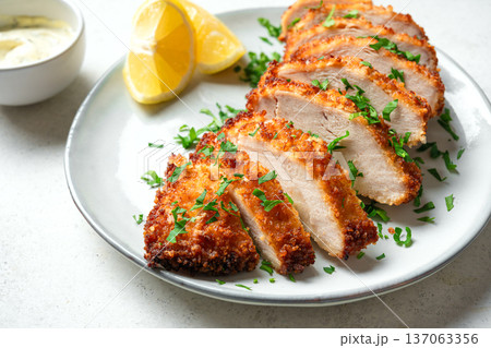 Crispy breaded chicken breast, panko chicken Crispy breaded chicken breast, panko chicken 137063356