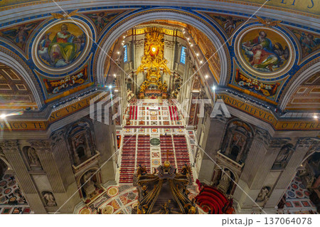 Visitors explore the interior of Saint Peter's Basilica in Vatican City during daylight hours 137064078