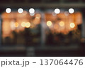 Soft focused image of cafe or restaurant  interior with golden bokeh lights at night 137064476
