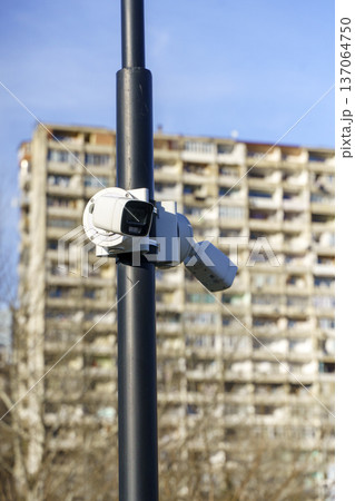 Surveillance Camera on Street Pole for Urban Security and Monitoring 137064750