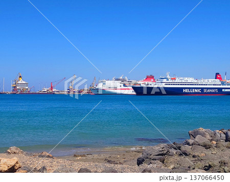 Harbor With Ferries And Blue Mediterranean Sea in Heraklion Crete, Greece Harbor With Ferries And Blue Mediterranean Sea in Heraklion Crete, Greece 137066450
