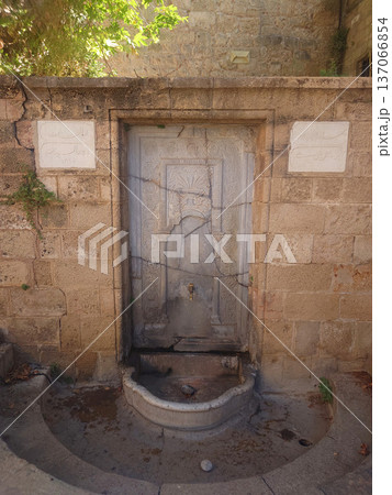 Historic Stone Fountain in Rhodes Old Town, Greece Historic Stone Fountain in Rhodes Old Town, Greece 137066854