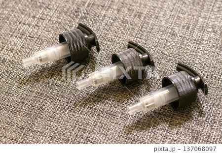 Black Saddle Pumps, which are ideal for dispensing products like body lotions, shampoos, and conditioners from bottles Black Saddle Pumps, which are ideal for dispensing products like body lotions, shampoos, and conditioners from bottles 137068097