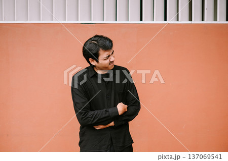 Young man suffering from severe stomach ache or nausea Young man suffering from severe stomach ache or nausea 137069541