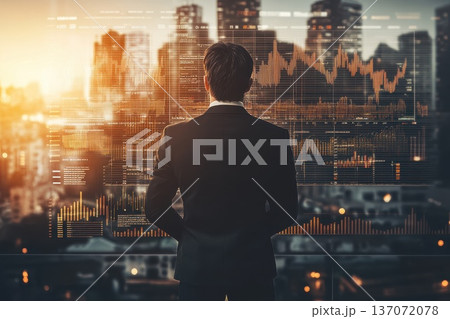 Business Strategist Analyzing Data Trends in Front of a City Skyline at Sunset 137072078