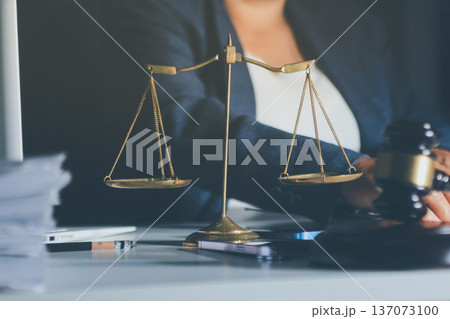 Businesswoman and Male lawyer or judge consult and conference having team meeting with client at law firm in office, Law and Legal services concept Businesswoman and Male lawyer or judge consult and conference having team meeting with client at law firm in office, Law and Legal services concept 137073100