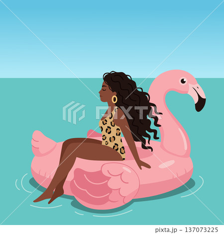Relaxed woman enjoying summer fun on a giant pink flamingo pool float, perfect for vacation, beach, and resort concepts 137073225