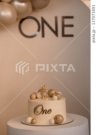 Elegant One Year Birthday Cake with Gold Teddy Bear and Balloons in Minimalist Pastel Theme Elegant One Year Birthday Cake with Gold Teddy Bear and Balloons in Minimalist Pastel Theme 137073891