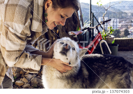 young pretty woman with husky dog outside, lifestyle people concept young pretty woman with husky dog outside, lifestyle people concept 137074303