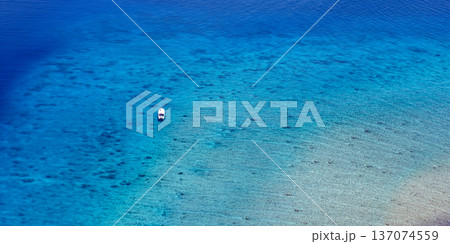 Tranquil Pristine Aerial Maldives Ocean Coral Reef Panorama with Turquoise Water and Tropical Island Paradise 137074559