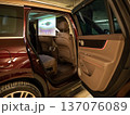 A projector opens in the car's interior for passengers to watch movies. 137076089