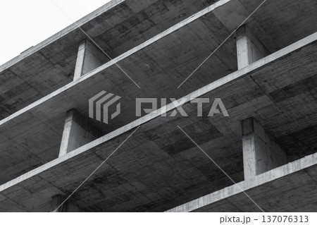 Concrete building is under construction, abstract photo Concrete building is under construction, abstract photo 137076313