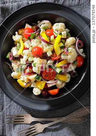 Greek cauliflower salad with feta cheese top view Greek cauliflower salad with feta cheese top view 137078546