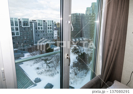 Winter view of Copenhagen, Denmark from Tivoli hotel window with snow covered buildings. Winter view of Copenhagen, Denmark from Tivoli hotel window with snow covered buildings. 137080291