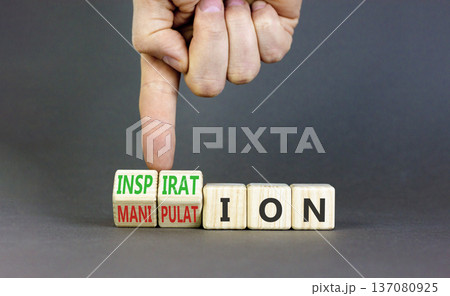Inspiration or manipulation symbol. Concept words Inspiration and Manipulation on wooden cubes. Beautiful grey background. Psychologist hand. Psychology inspiration manipulation concept. Copy space. Inspiration or manipulation symbol. Concept words Inspiration and Manipulation on wooden cubes. Beautiful grey background. Psychologist hand. Psychology inspiration manipulation concept. Copy space. 137080925