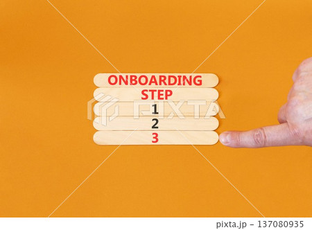 Time to step 3 onboarding symbol. Concept words Onboarding step 3 on beautiful wooden block. Businessman's hand. Beautiful orange background. Business success step 3 onboarding concept. Copy space. 137080935