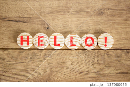 Hello welcome support and help symbol. Concept word Hello on beautiful wooden circles. Beautiful wooden background. Business psychological hello support and help concept. Copy space. 137080956