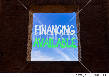 Financing available symbol. Concept words Financing available on beautiful blue sky in window in ancient wall. Beautiful blue sky background. Business financing available concept. Copy space. Financing available symbol. Concept words Financing available on beautiful blue sky in window in ancient wall. Beautiful blue sky background. Business financing available concept. Copy space. 137081011