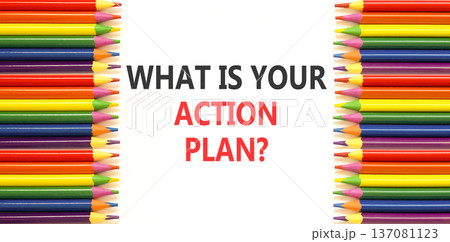 What is your action plan symbol. Concept words What is your action plan on beautiful white paper. Beautiful white background. Colored pencils. Business what is your action plan concept. Copy space. 137081123