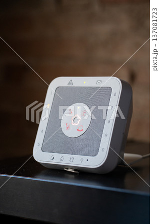 Smart home security system keypad with touch control panel displaying warning and alarm icons, ensuring protection, safety, and surveillance for modern lifestyles Smart home security system keypad with touch control panel displaying warning and alarm icons, ensuring protection, safety, and surveillance for modern lifestyles 137081723