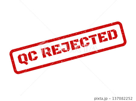 A red rubber stamp impression showing QC REJECTED text with distressed texture on a surface 137082252