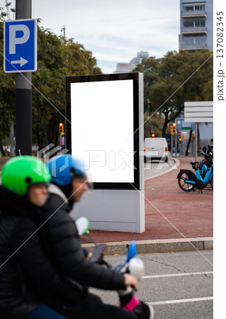Blank white street advertising billboard on a city street Blank white street advertising billboard on a city street 137082345