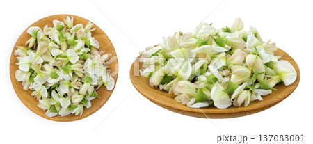 flowers of Sophora japonica or Styphnolobium japonicum in wooden bowl isolated on white background. Top view. Flat lay 137083001