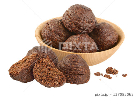 chocolate cookie with kerob, banana, nuts and coconut paste isolated on white background. Healthy food, gluten-free, flour-free 137083065