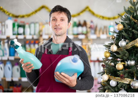On New Year Eve, man choose liquid detergent and glass cleaner for allergy sufferers On New Year Eve, man choose liquid detergent and glass cleaner for allergy sufferers 137086218