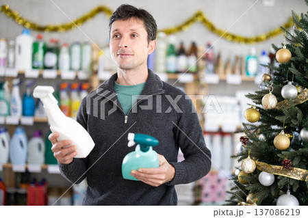 On New Year Eve, man choose glass cleaner for allergy sufferers 137086219