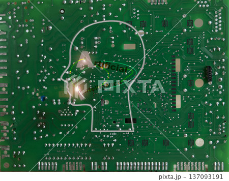 ai text on circuit board with glowing head outline concept 137093191