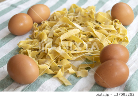 fresh egg tagliatelle pasta with whole eggs fresh egg tagliatelle pasta with whole eggs 137093282