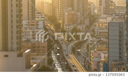 Golden Hour Light Shines Across Bustling Kowloon Road Network Feb 15 2026 137095063
