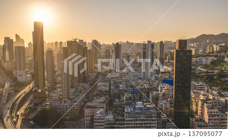 Kowloon City Skyline Glows Brightly Beneath Clear Evening Sun Feb 15 2026 Kowloon City Skyline Glows Brightly Beneath Clear Evening Sun Feb 15 2026 137095077