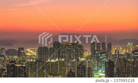 Golden Sunset Over Kowloon Expansive Urban Skyline Feb 13 2026 137095218
