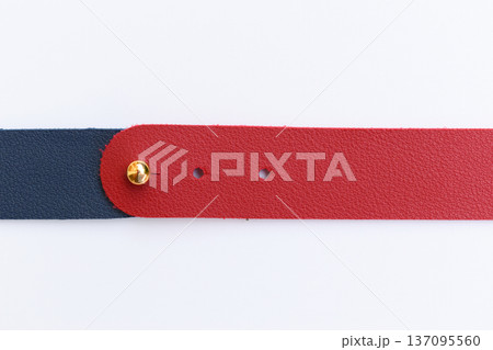 dark blue and red leather strap isolated on white background 137095560