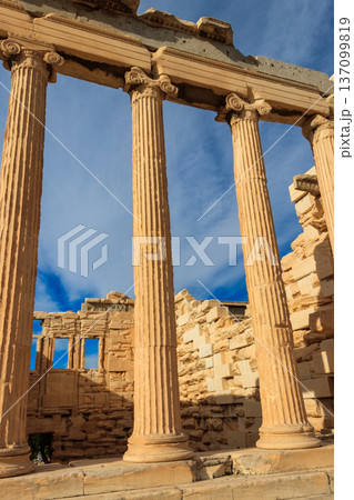 Erechtheion (Erechtheum) or Temple of Athena Polias is an ancient Greek Ionic temple on the north side of the Acropolis in Athens, Greece Erechtheion (Erechtheum) or Temple of Athena Polias is an ancient Greek Ionic temple on the north side of the Acropolis in Athens, Greece 137099819
