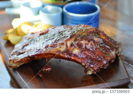 pork rib or pork steak , barbecue pork rib with french fries pork rib or pork steak , barbecue pork rib with french fries 137100003