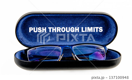 An open black glasses case with plush blue lining cradles sleek blue eyeglasses An open black glasses case with plush blue lining cradles sleek blue eyeglasses 137100948