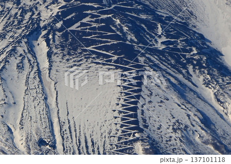 Closeup of Mt. Fuji, Fuji-san, Fujiyama, as seen from Lake Yamanakako in Yamanashi Japan during the winter. 137101118