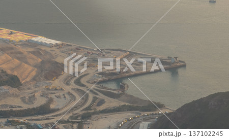 Golden Hazy Sunset Over Expansive Fat Tong O Coastline Feb 22 2026 137102245